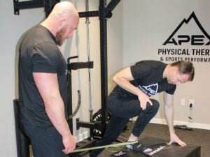 Physical Therapists from Apex Physical Therapy demonstrate movement.